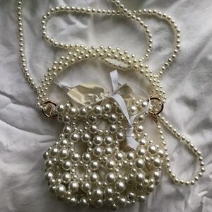 White pearl handbag